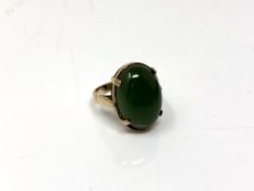 A 9ct gold jade ring, size M CONDITION REPORT: 5.