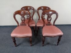 A set of four Victorian style mahogany dining chairs