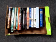 A box containing coffee table art books