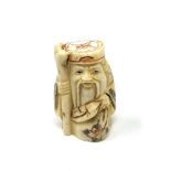 A carved Chinese bone netsuke - Elderly Gentleman with staff