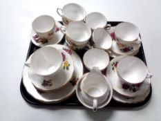 A tray of two part Colclough and Royal Vale bone china tea services