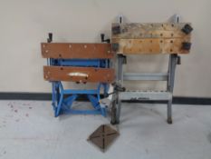 Two folding work benches together with an electric drill and drill stand