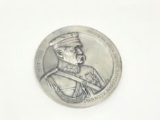 A Polish white metal medallion depicting Marshal Pilsudski