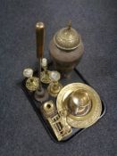 A tray containing assorted brass wares to include fire poker on stand, candlesticks,