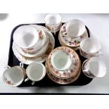 A tray of three part bone china tea services - Stanley,