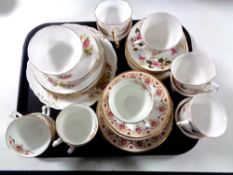 A tray of three part bone china tea services - Stanley,