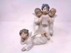 A Lladro figure, group cherub choir, together with a further Lladro figure,