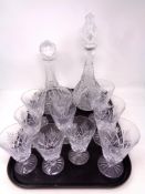A tray containing assorted Webb crystal wine glasses together with a lead crystal ship's decanter