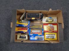 A box containing boxed die cast vehicles to include Corgi Classics, buses,