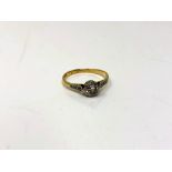 An 18ct gold solitaire diamond ring, the brilliant cut stone weighing approximately 0.