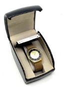 A gent's Christin Lars Diamond gold plated quartz calendar wristwatch, boxed.