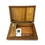 A wooden cigar humidor