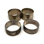 Two pairs of silver napkin rings CONDITION REPORT: 70.