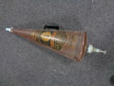 A vintage Minimax Cone fire extinguisher bearing advertisement