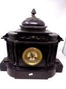 A Victorian black slate mantel clock with Corinthian column supports, brass and enamel dial,