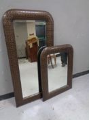 A pair of contemporary faux snakeskin framed bevel edged mirrors