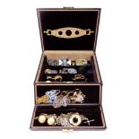 A leather Dulwich jewellery box containing costume jewellery to include beaded necklaces, bangles,