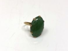 A 9ct gold jade ring, size L CONDITION REPORT: 5.