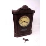 An Edwardian eight day mantel clock with key