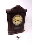 An Edwardian eight day mantel clock with key