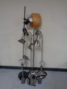 Four assorted floor lamps together with a pair of Asger angle-poise table lamps (continental