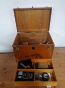 A 20th century Sako plywood box containing battery charger, Precision Gold Academy PG 10B tester,
