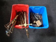 Two tubs containing large drill bits, chain, socket sets,