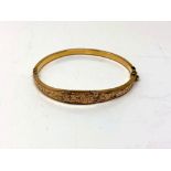 A 9ct gold hinged bangle CONDITION REPORT: 5.