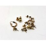 Seven pairs of 9ct gold/ yellow metal earrings CONDITION REPORT: 10.
