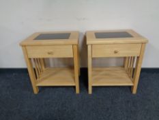 A pair of pine side tables fitted a drawer with shelf beneath,