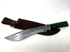 A Bowie knife with pattern-welded blade,