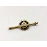 A 9ct gold and enamel Hexham Inner Wheel brooch CONDITION REPORT: 4.