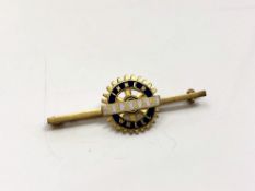 A 9ct gold and enamel Hexham Inner Wheel brooch CONDITION REPORT: 4.