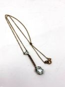 An Edwardian 9ct gold and aquamarine pendant on chain CONDITION REPORT: 3.3g gross.