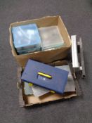 Two boxes containing toolbox and plastic boxes containing hardware, paint brushes,