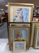 A gilt chalk framed mirror together with a framed watercolour, Lindisfarne Causeway,