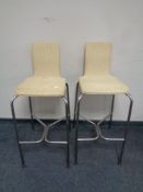 A pair of contemporary Lloyd Loom bar chairs on metal legs
