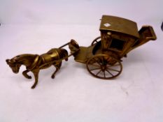 A brass horse and cart ornament