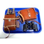 A tray containing a leather cased Zenith stereo, field glasses,