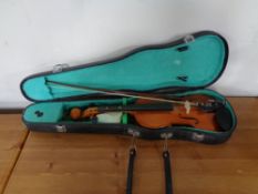 A Locto violin and bow in case