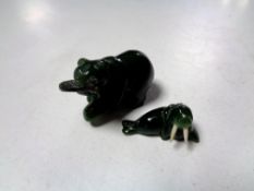 Two jade figures of a walrus and polar bear