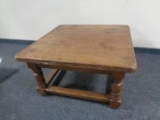 A square oak coffee table