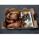 A box of a quantity of hippopotamus ornaments to include wooden glass and ceramic examples
