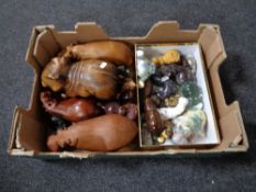 A box of a quantity of hippopotamus ornaments to include wooden glass and ceramic examples