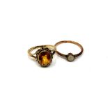 A 9ct gold citrine ring together with a similar agate ring (2) CONDITION REPORT: 3.