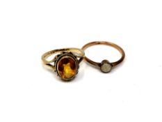 A 9ct gold citrine ring together with a similar agate ring (2) CONDITION REPORT: 3.