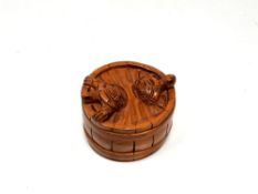 A carved Chinese hardwood netsuke - Two turtles in a barrel