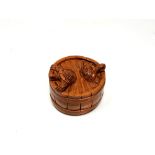 A carved Chinese hardwood netsuke - Two turtles in a barrel