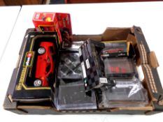 A box of boxed die cast vehicles including Burago Ferrari F40,