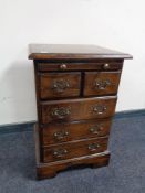 A good quality oak five drawer chest with slide,